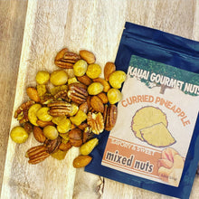 Kauai Gourmet Nuts Curried Pineapple mixed nuts on a wooden board